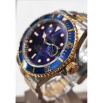 Montre d'occasion ROLEX Submariner Date homme mouvement automatique certifié (cosc) bracelet or jaune 750/000 et acier - vue D1