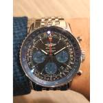 Montre d'occasion BREITLING Navitimer B01 homme mouvement automatique certifié (cosc) bracelet acier - vue porté 1