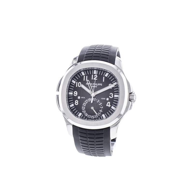 Montre d'occasion PATEK PHILIPPE Aquanaut Travel Time homme mouvement automatique certifié (cosc) bracelet caoutchouc - vue porté 3