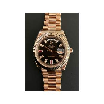 Montre d'occasion ROLEX Day-Date homme mouvement automatique certifié (cosc) bracelet or rose 750/000