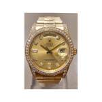 Montre d'occasion ROLEX Day-Date Diamants mixte mouvement automatique certifié (cosc) bracelet or jaune 750/000 - vue 1