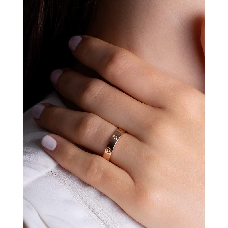 Bague d'occasion CARTIER Alliance Love 1 diamant mixte or rose 750/1000 - vue porté 2