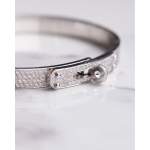Bracelet d'occasion HERMES Kelly Petit Modèle femme or blanc 750/1000 - vue D1