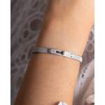 Bracelet d'occasion HERMES Kelly Petit Modèle femme or blanc 750/1000 - vue porté 1