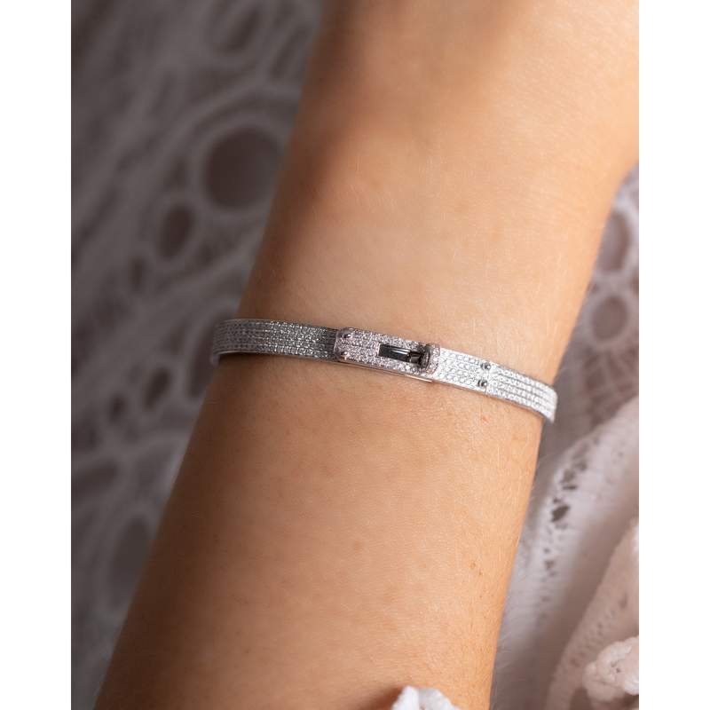 Bracelet d'occasion HERMES Kelly Petit Modèle femme or blanc 750/1000 - vue porté 1